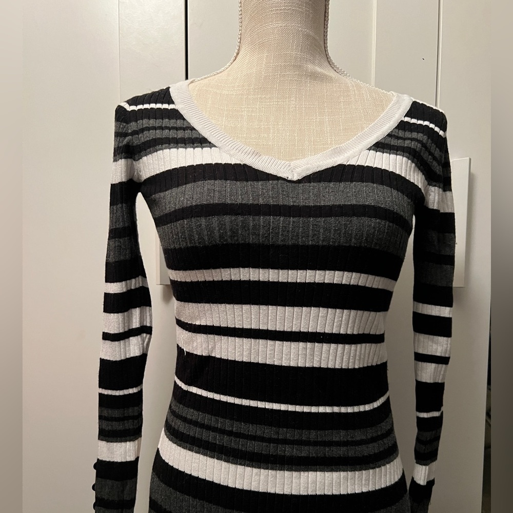 | Black & white striped top |